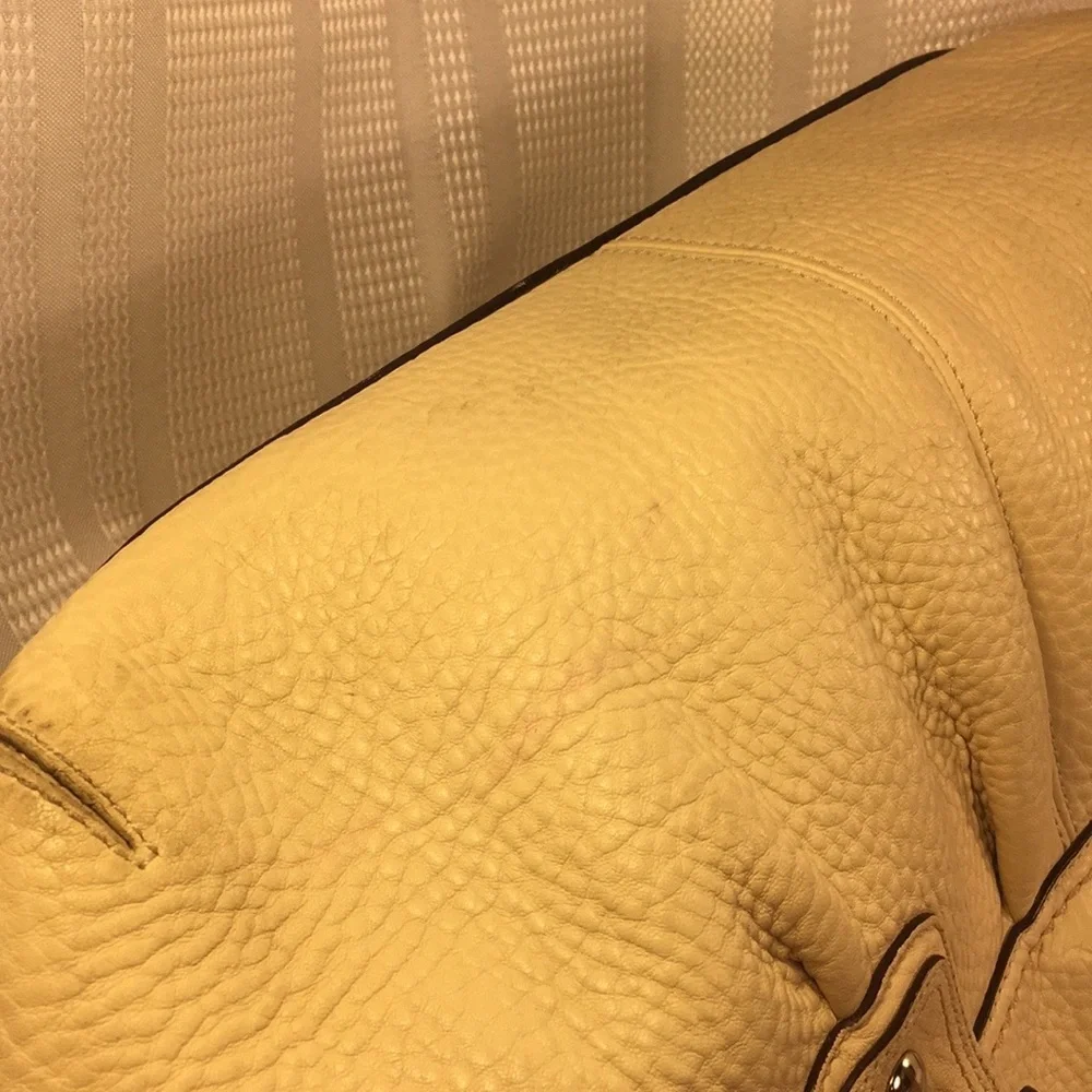 Coach large leather bag w/iconic buckles & charm